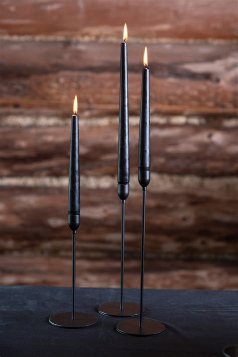 thin black candlestick holders